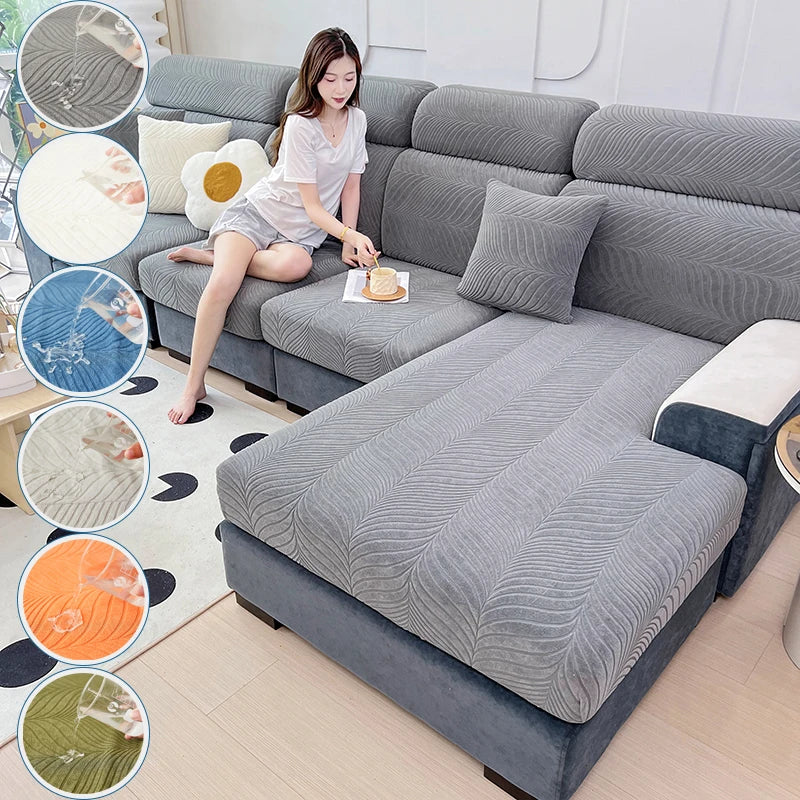 A gray jacquard stretch sofa cover is shown on a sectional sofa, with various fabric swatches displayed around it.