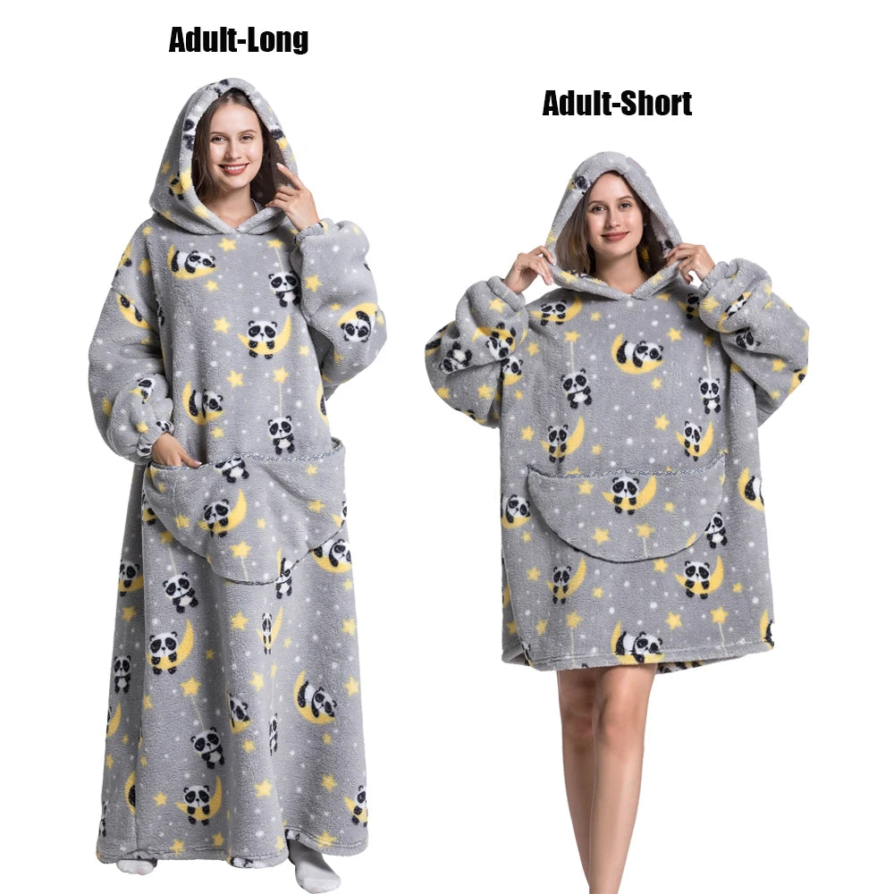 A gray plush fleece blanket hoodie with a pattern of skulls and moons shown in adult-long and adult-short styles.