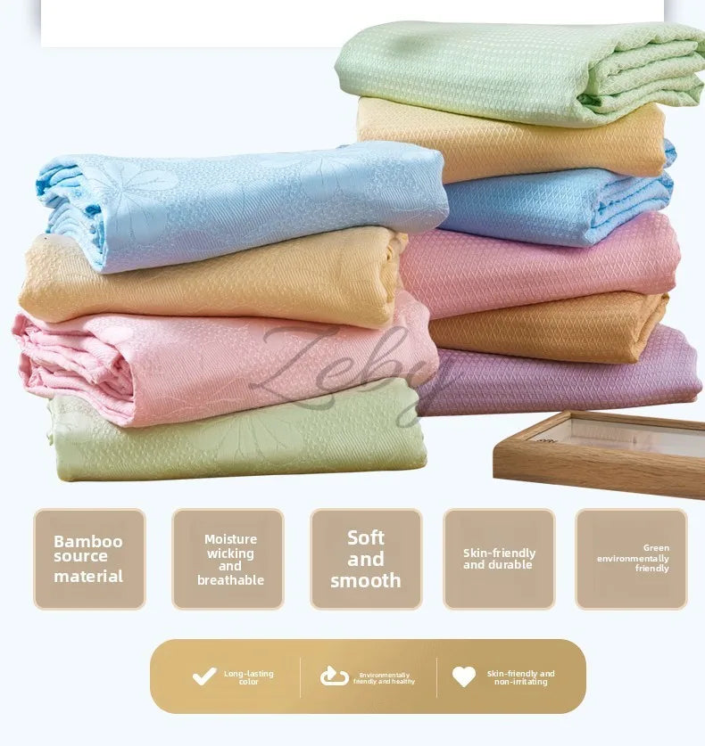 A stack of soft, breathable bamboo fiber cooling blankets in various pastel colors like mint green, light blue, pink, and bei