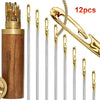 A set of 12 gold-tipped stainless steel sewing needles with a wooden container.
