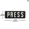 Black embroidered patch with the word PRESS in white text and hook and loop backing