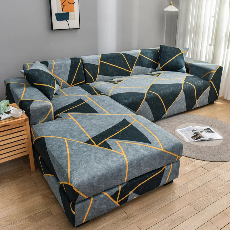A modern sofa protector cover featuring a geometric pattern in gray, black, and orange accents.