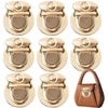 A set of gold metal twist locks for bags and cases shown in various views.