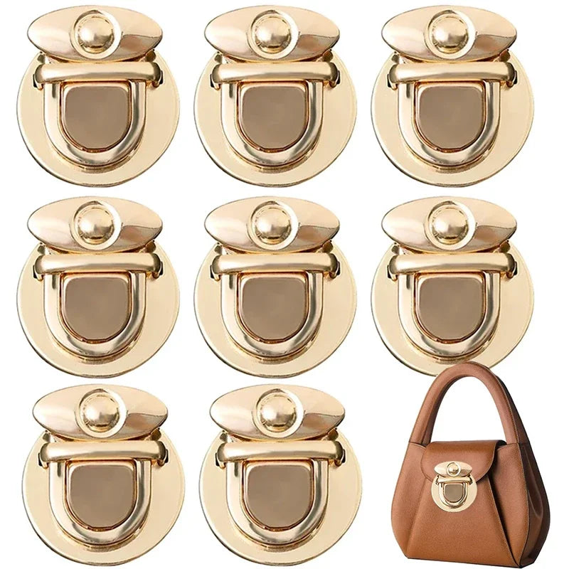 A set of gold metal twist locks for bags and cases shown in various views.