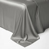 A smooth, draped gray luxury Egyptian cotton bedding set fabric.