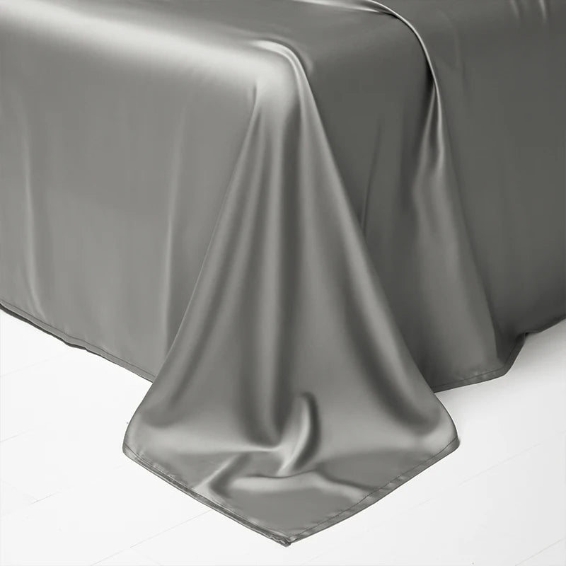 A smooth, draped gray luxury Egyptian cotton bedding set fabric.