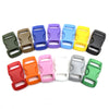 A collection of colorful adjustable plastic paracord buckle bracelets arranged in a row.