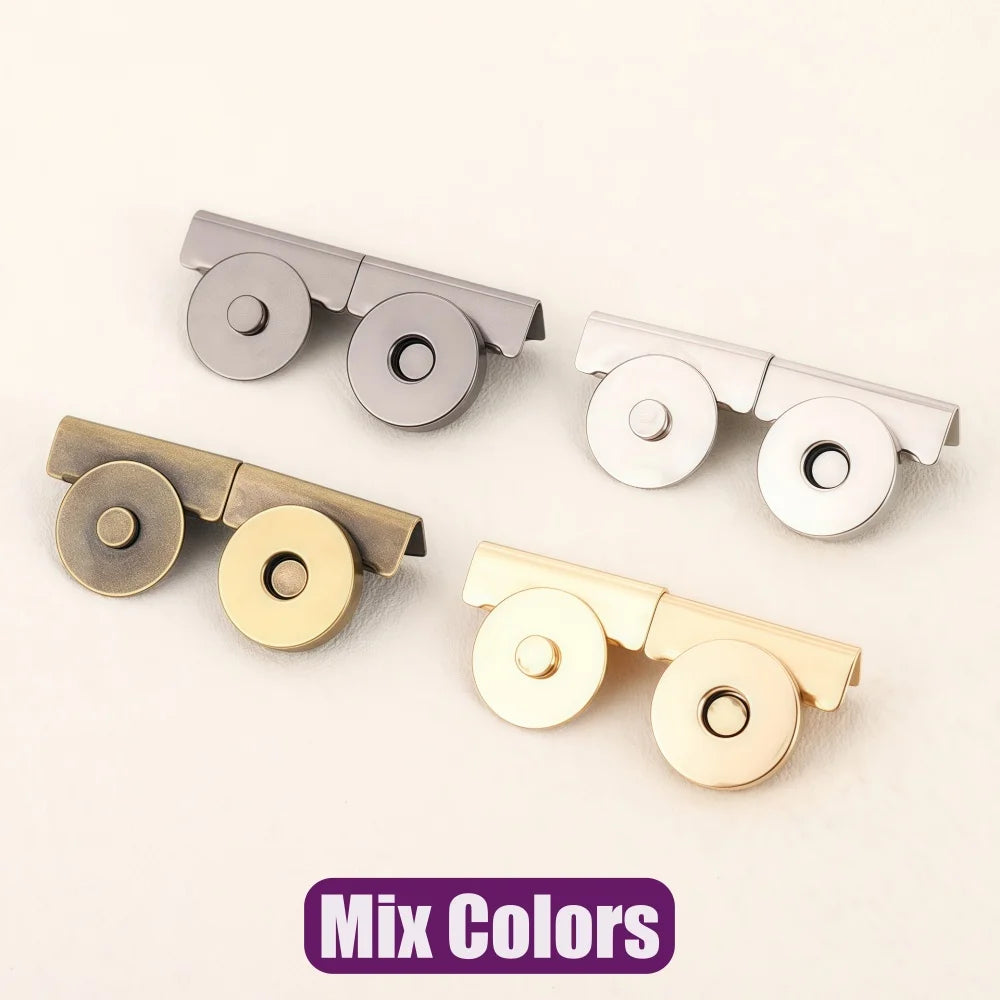 Three seamless magnetic button clasps in silver, gold, and brass colors displayed on a light background.