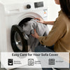 A person is placing a gray sofa cover into a white washing machine for easy care.
