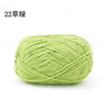 A ball of light green 3mm matte chenille yarn for knitting and crochet.