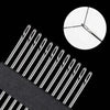 A close-up view of a stainless steel sewing kit with various size needles against a black background.
