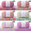 A set of ten spools of 4-ply cotton knit yarn in various shades of pink, green, and blue for gradient projects.