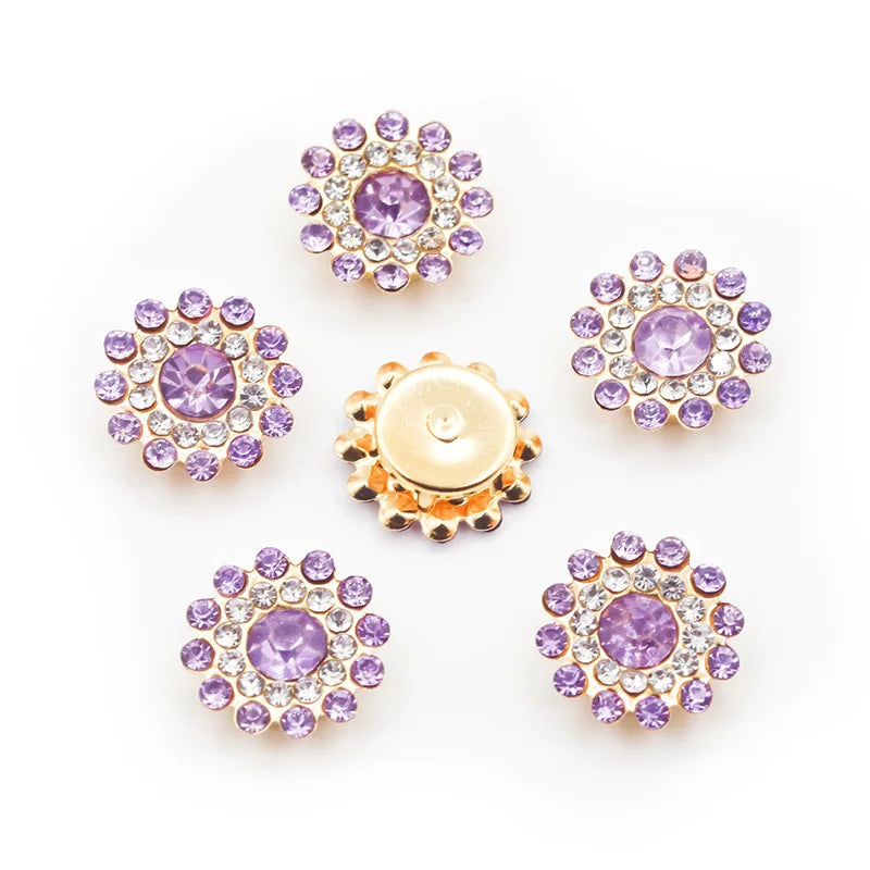 A collection of round, multi-colored rhinestone crystals in various sizes and shapes.