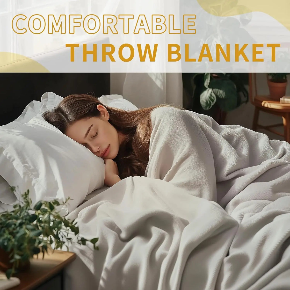 A woman is relaxing under a soft, light-colored throw blanket in bed.