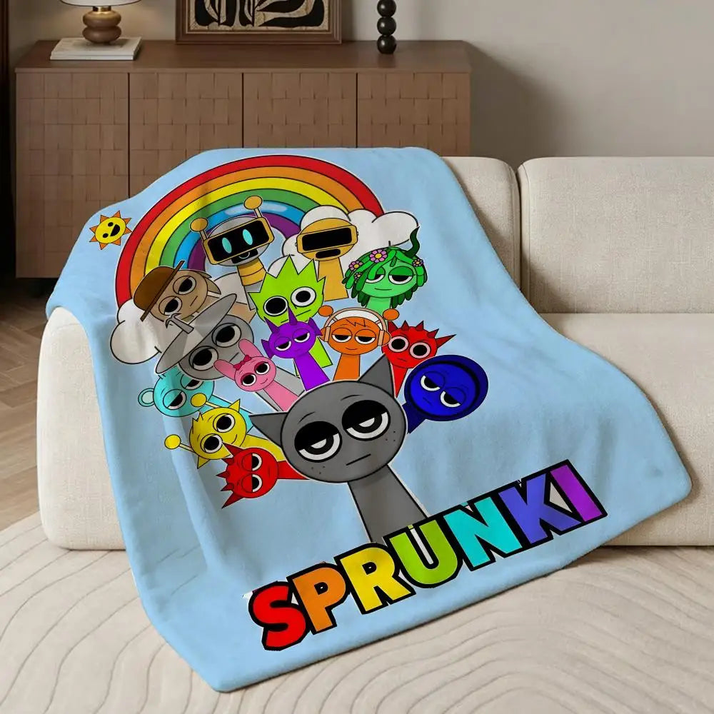 A light blue flannel blanket featuring colorful characters and a rainbow design.