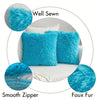 Two bright blue faux fur throw pillow covers showing a well-sewn texture and smooth zipper detail.