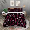A black and pink heart patterned duvet cover set with two pillowcases and a quilt cover displayed on a bed.