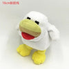 A white stuffed dragon plush toy with yellow feet and a red tongue.
