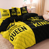 A couple duvet set featuring black and yellow crown print bedding with Queen and King designs.