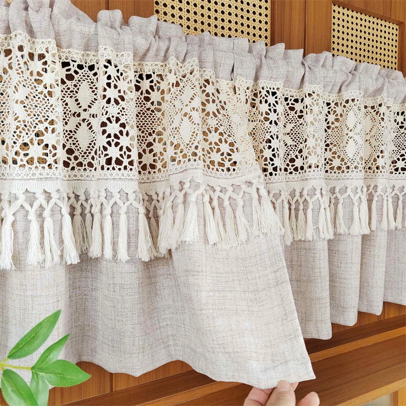 Sheer beige geometric lace short curtains hanging on a wooden shelf.