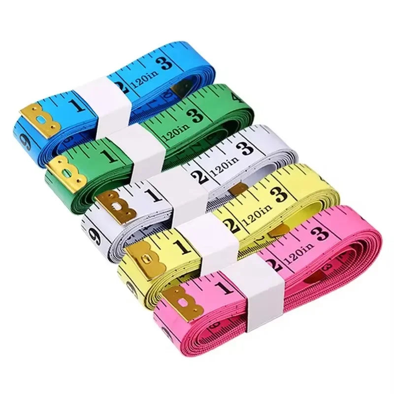 Rolls of flexible fiberglass body measuring tape in various colors and lengths