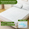 White bamboo fiber fitted sheet mattress protector displayed on a bed, showing the fabric and construction details.