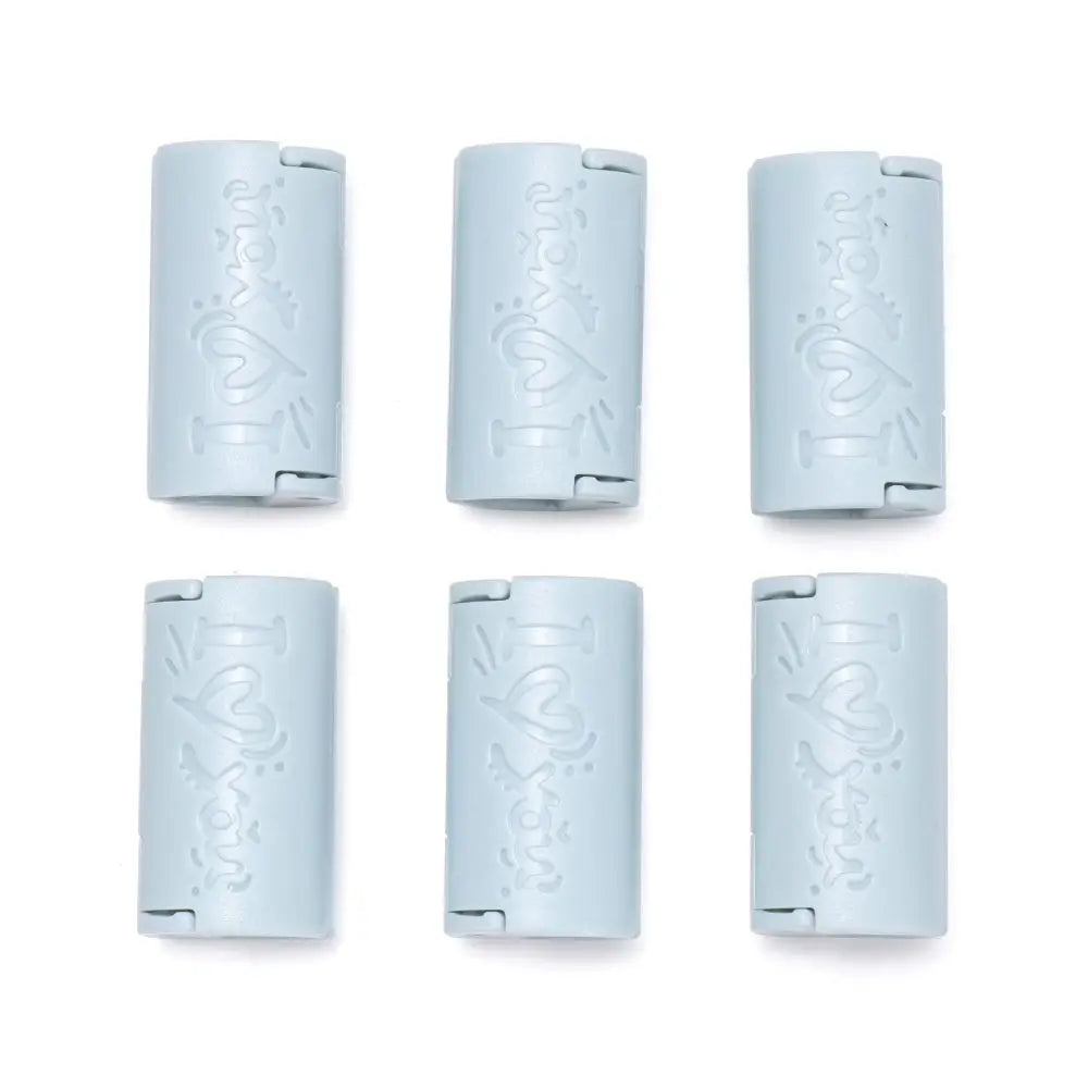 Six packs of light blue invisible sheet clips for securing bedding