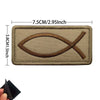 A rectangular embroidered patch featuring a cross and flag design on a beige fabric background.