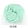 A ball of light mint green chunky acrylic yarn for knitting and crochet projects