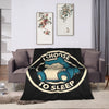 A black plush decorative throw blanket featuring a cartoon blue sleeping cat design.