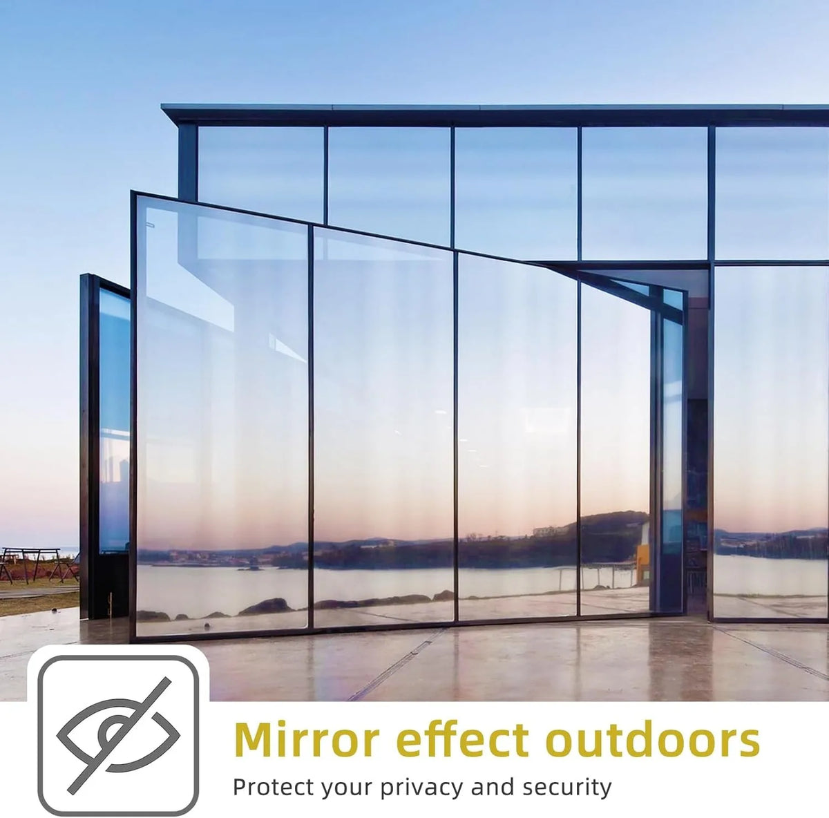 A modern glass facade featuring mirror effect outdoor film protecting privacy and security.