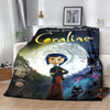 An animated print blanket featuring the character Coraline from the movie set against a dark, whimsical background.