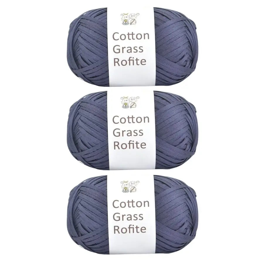 A set of three skeins of natural cotton grass roving yarn in a dusty blue color.