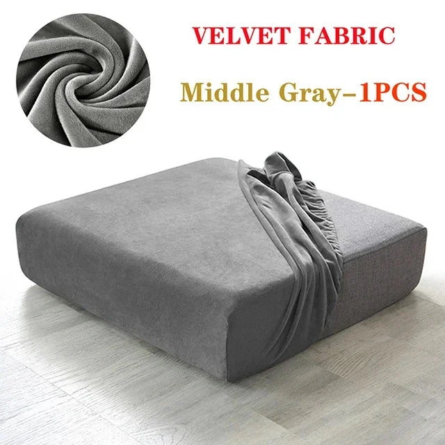 A gray velvet fabric sofa seat cover displayed on a light wooden floor.