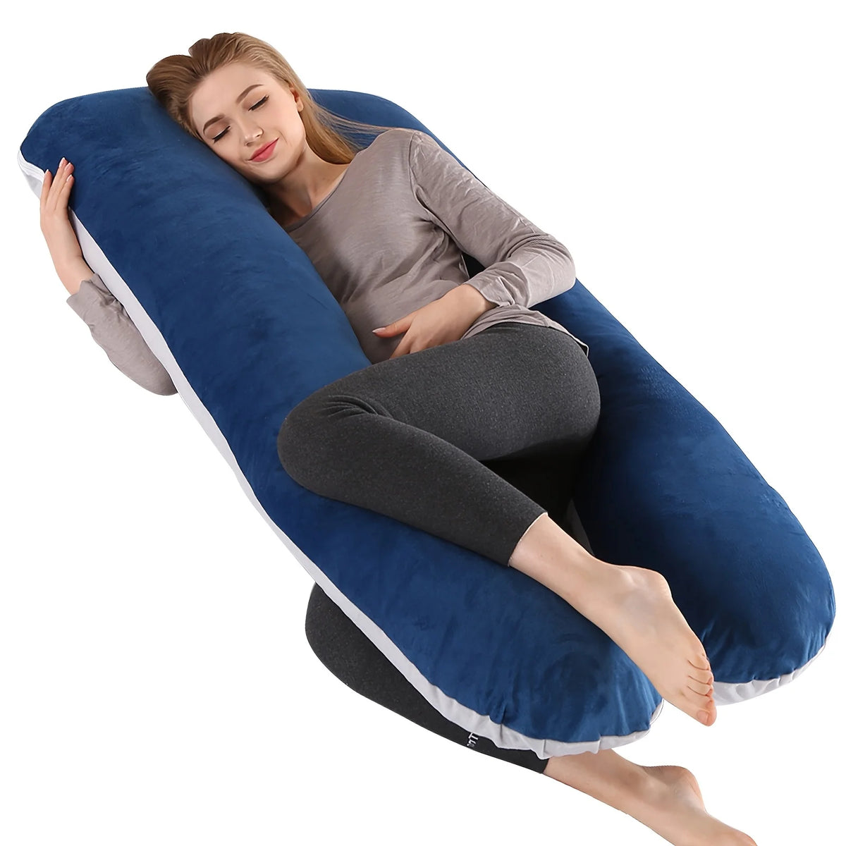 A woman relaxing on a blue U-shaped memory foam pillow.