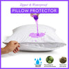 A hand is pouring purple liquid onto a white pillow protector, demonstrating its waterproof and antibacterial barrier.