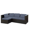 A dark brown wicker outdoor sofa with gray cushion covers.