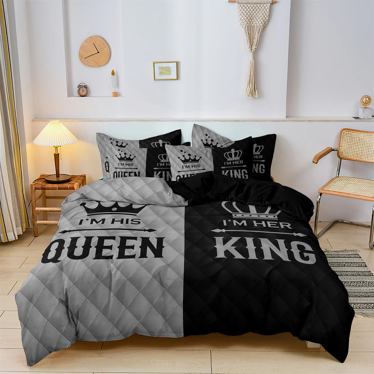 A couple duvet set featuring a black and gray crown print on microfiber bedding displayed in a bright room.