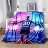 A large blanket featuring a soccer player in a blue jersey with the number 30 and French national colors.