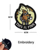 Embroidered tactical patch featuring a dog looking surprised with the text This Is Fine