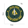 A round olive green embroidery patch featuring a yellow lightning bolt design and text reading DELTA FORCE UNITED STATES ARMY