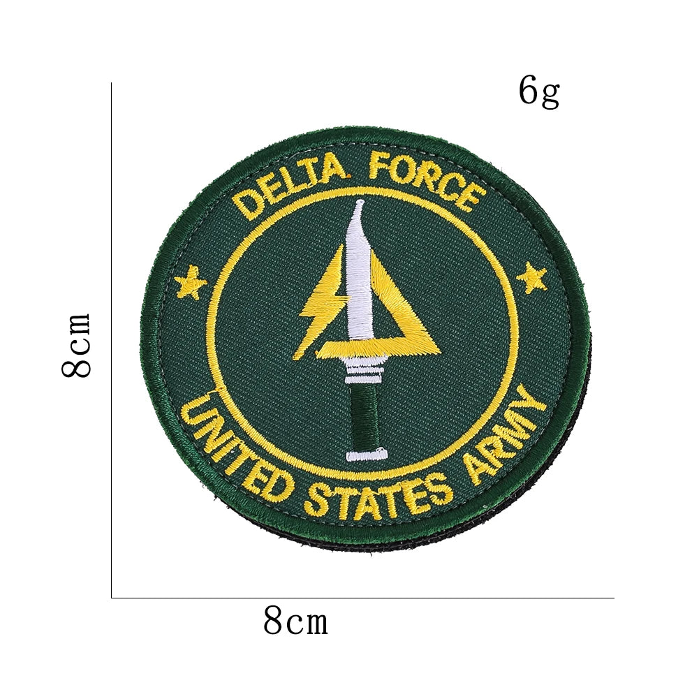 A round olive green embroidery patch featuring a yellow lightning bolt design and text reading DELTA FORCE UNITED STATES ARMY