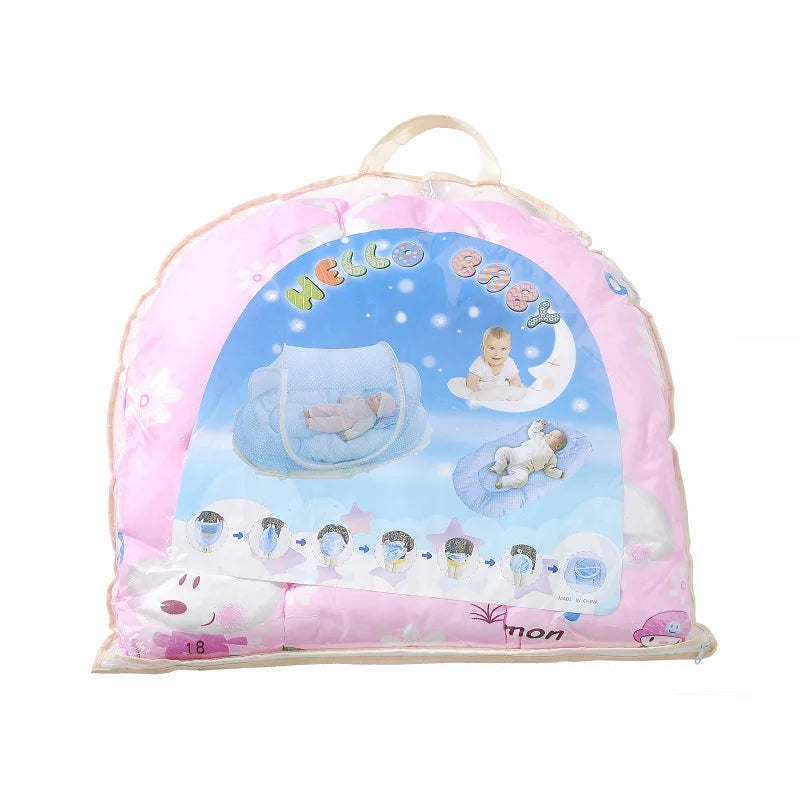 Pink foldable baby mosquito net sleeping tent with a blue sky design featuring a baby and moon