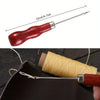 A leather craft sewing kit showing a wooden handle and metal needle used to thread waxed thread onto leather.
