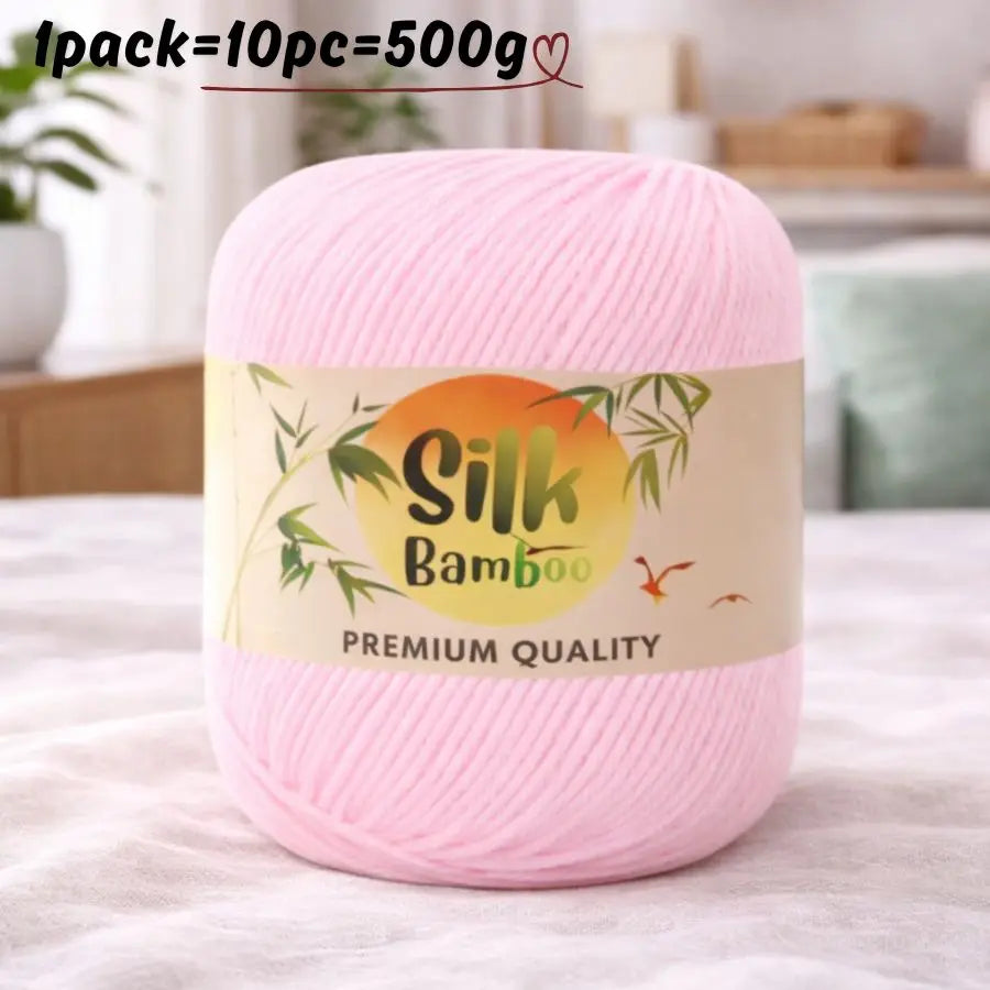 Pink silk bamboo blend yarn skein used for knitting and crochet projects