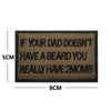 A rectangular black embroidered patch with white text that reads If your dad doesn't have a beard you really have 2 moms