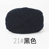 A ball of black organic cotton 4ply knitting yarn for crafts.
