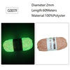 A spool of bright green glow-in-the-dark polyester yarn labeled G007F for knitting and crochet.