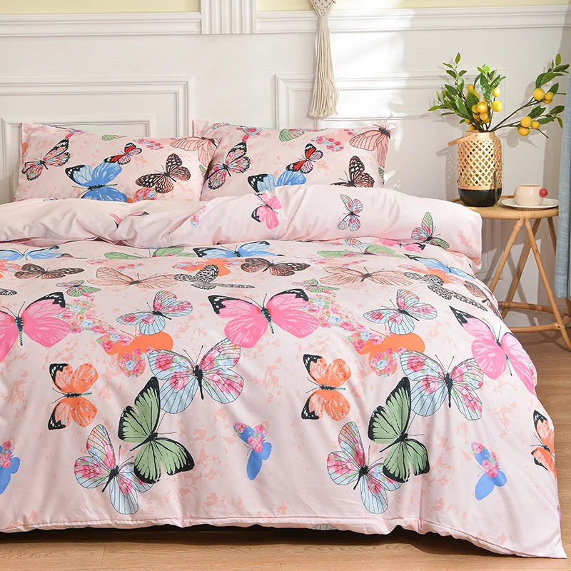 Pink duvet cover set with a floral butterfly print featuring pink, blue, and orange colors.
