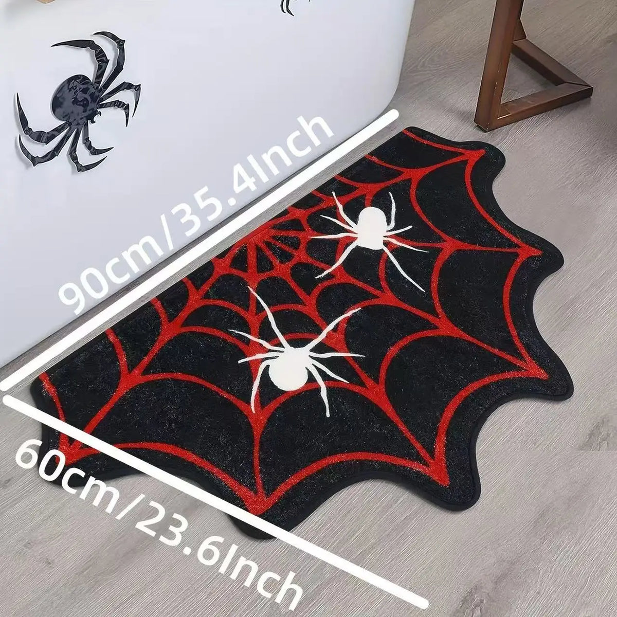 Black decorative non-slip mat featuring a red spiderweb design with white spiders.